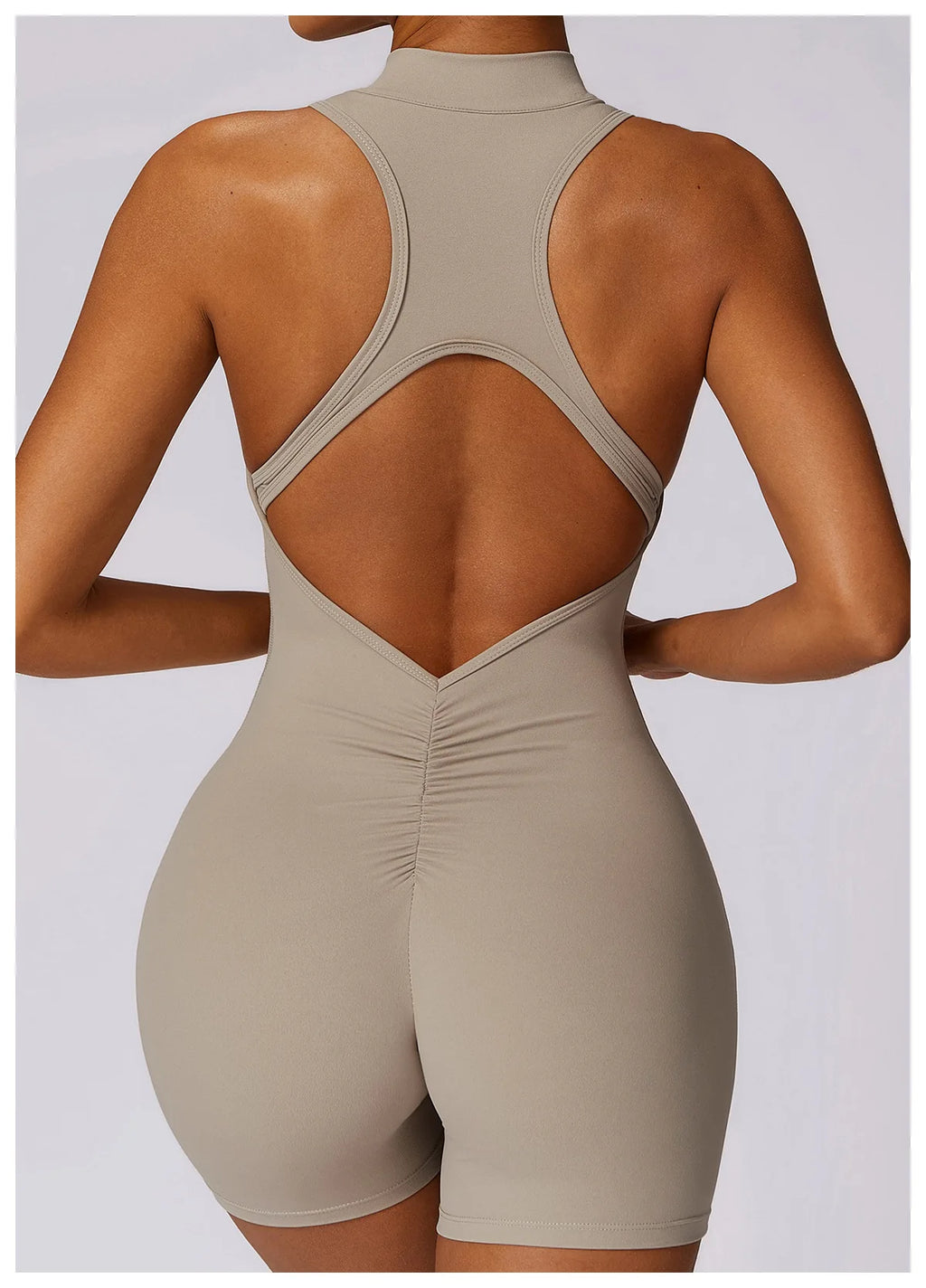 Beige bodysuit with open back on a plain background brand Gymelle